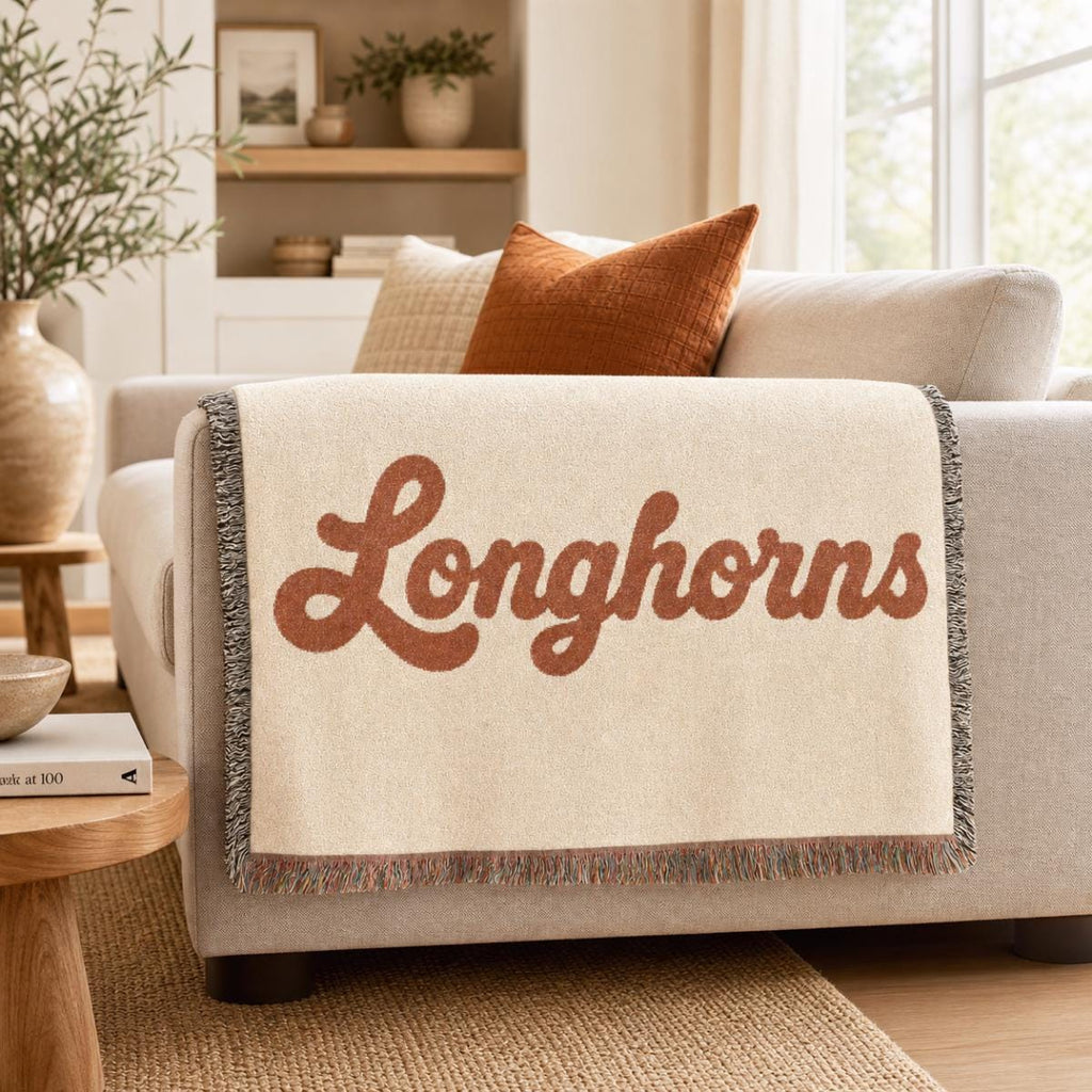 Longhorns script Woven Blanket | fringed throw, retro cowhide colors
