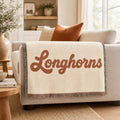 Longhorns script Woven Blanket | fringed throw, retro cowhide colors